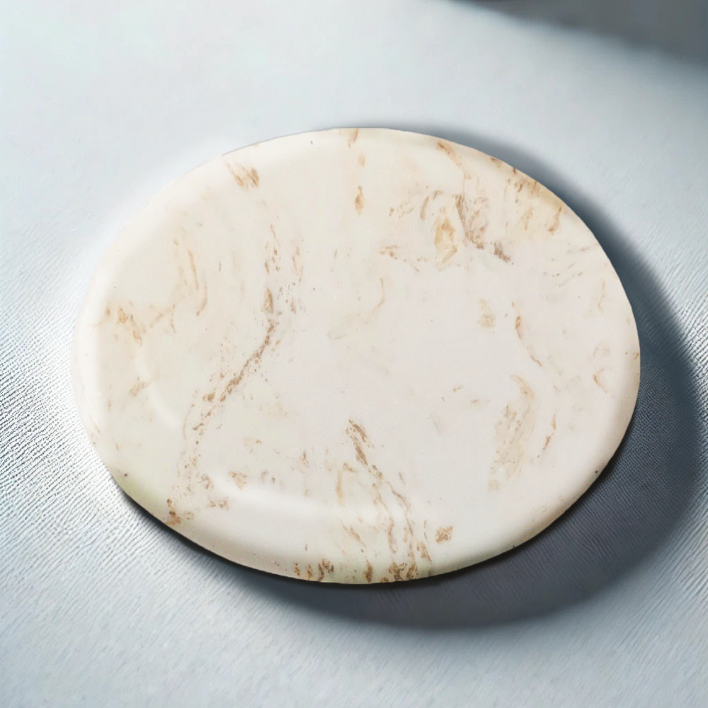 Round marble coaster on a light gray surface